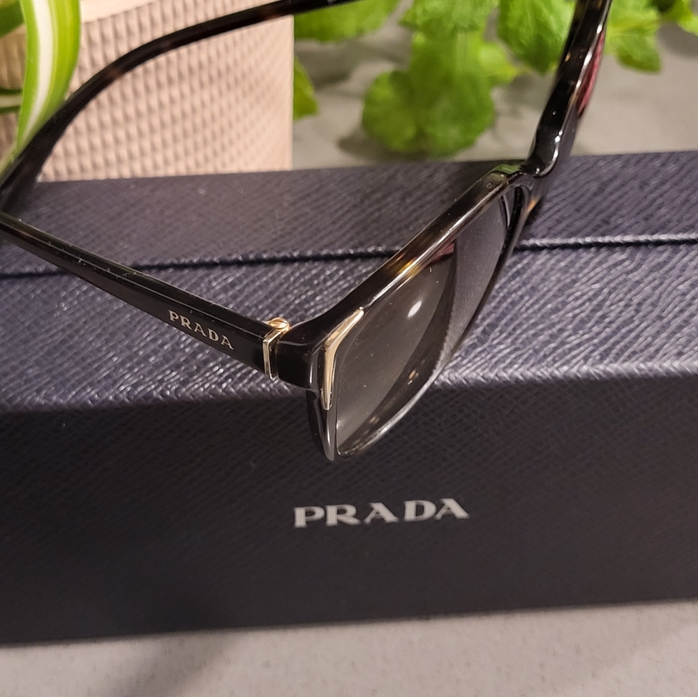 Prada Sunglasses.